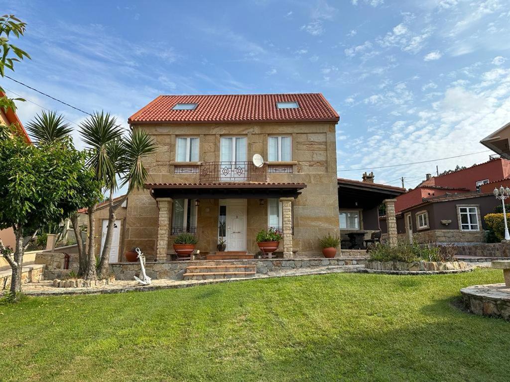 Villa Casa De Romaxe à Muros Extérieur photo